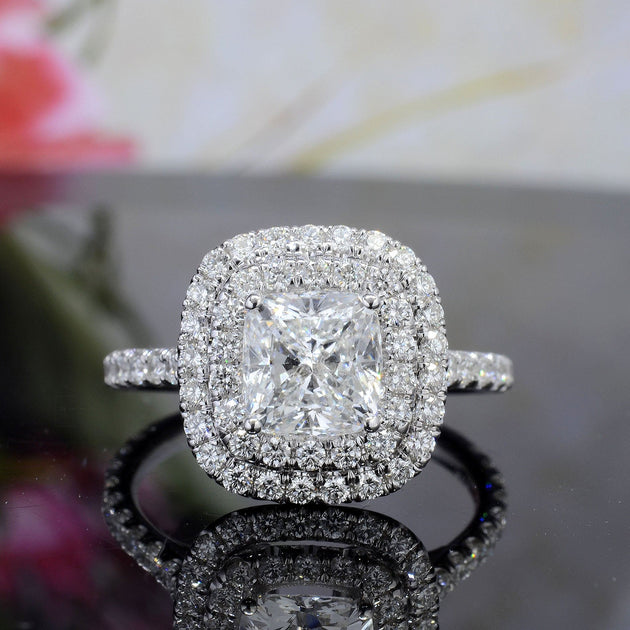 Double halo cushion on sale cut diamond ring