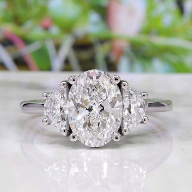 3 Stone Oval Diamond Ring with Half Moons